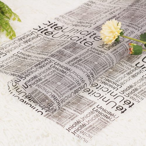 063091 PLASTIC WRAPPING SHEET, SET OF 20, WITH NEWSPAPER PATTERN PASTEL BLACK